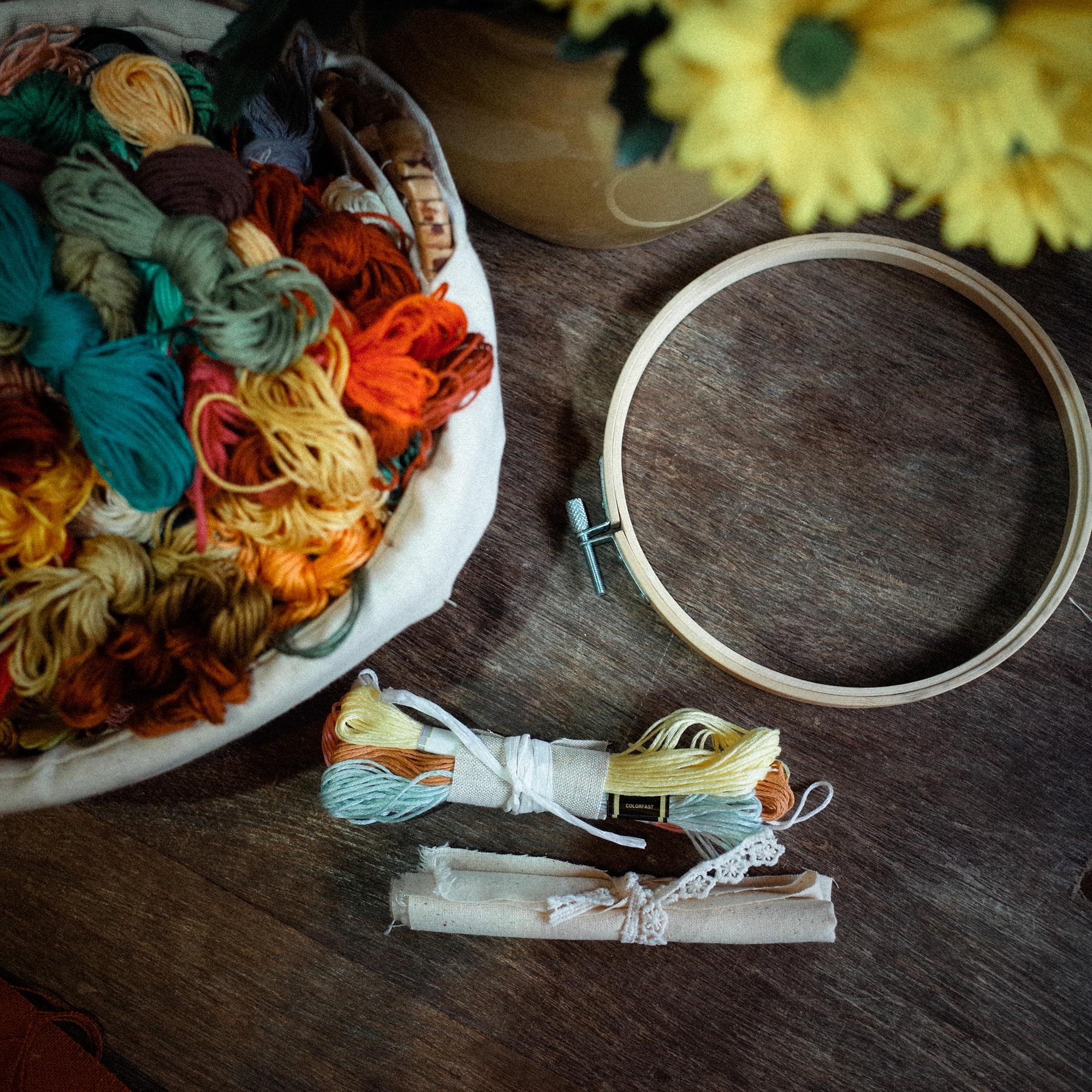 large embroidered hoop with mixed floral stitches